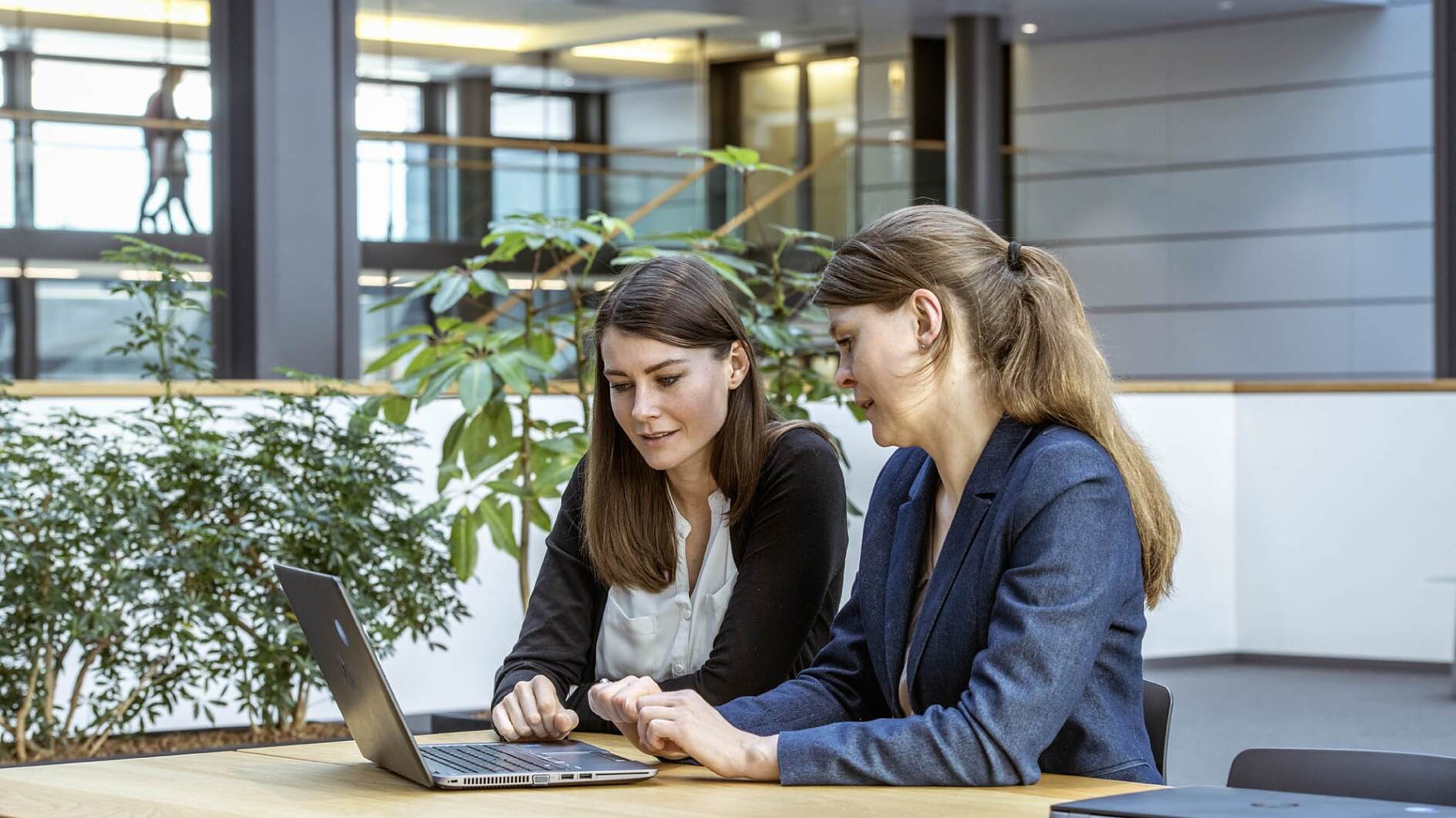 Two people meeting in an office