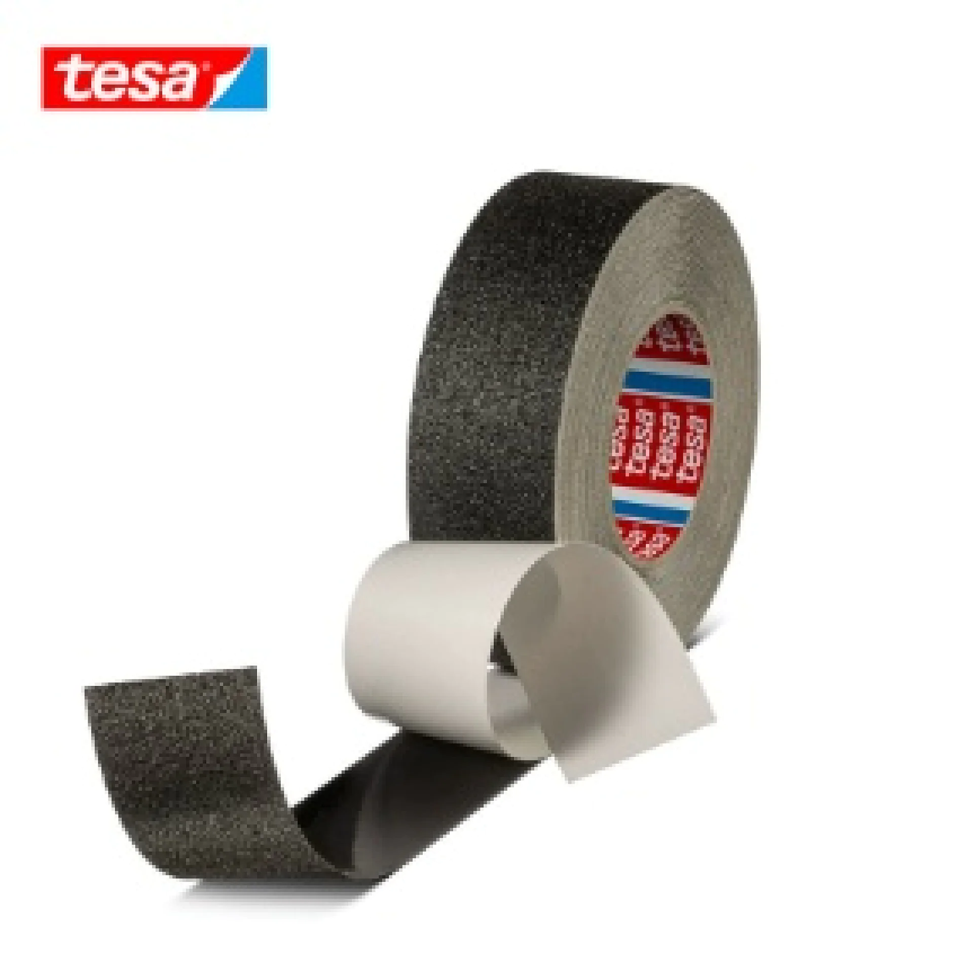 A roll of black adhesive tesa tape, partially unrolled, showing the sticky side. The label inside the roll is red with white text. A piece of the tesa tape is peeled off, displaying its adhesive underside. (This text has been generated by AI)